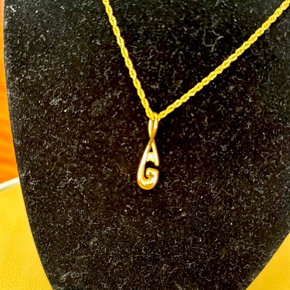 Givenchy Gold plated necklace G logo with crystal. Non tarnish or discoloration